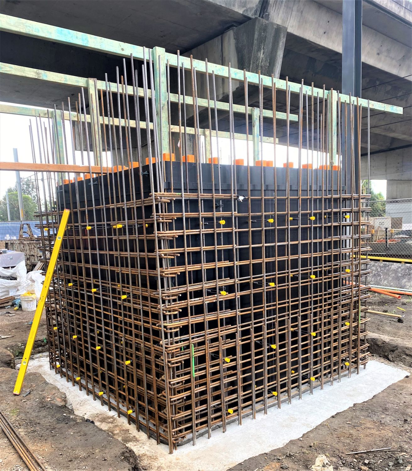 Lift pit reinforcement cage and formwork built beneath the road viaduct