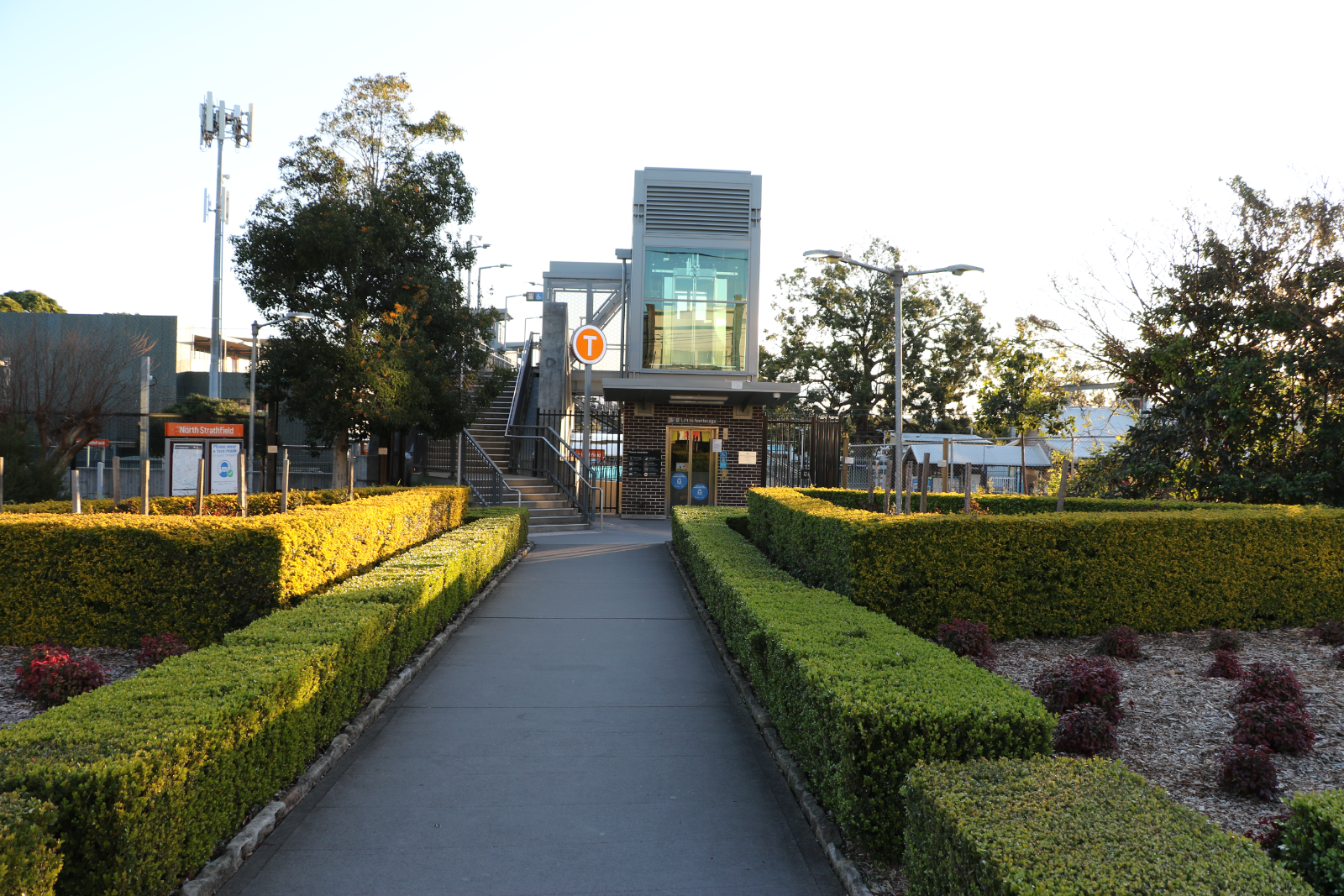Garden approach path leading to the new lift and footbridge